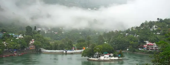Original photograph of Bhimtal Lake beneath misty hills
